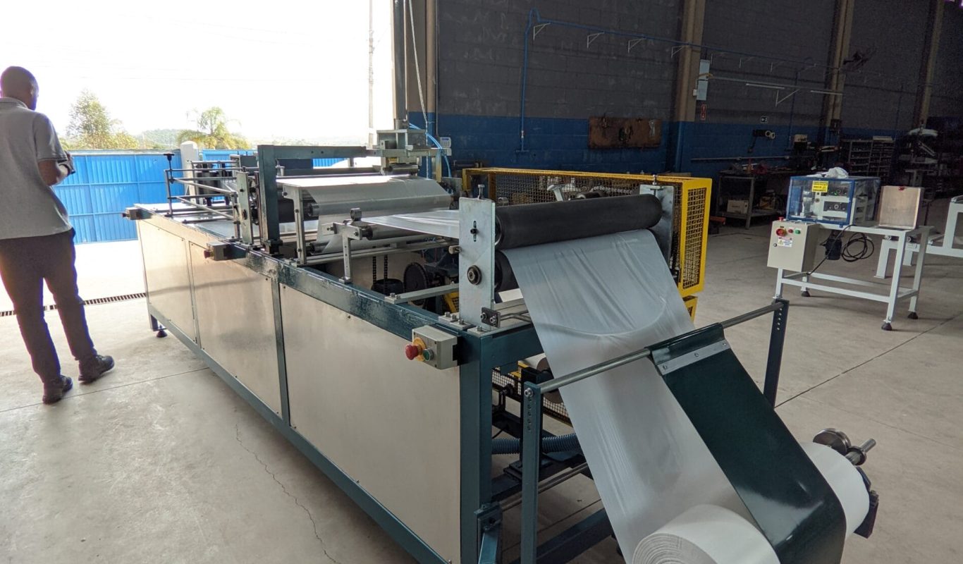 Máquina para Capa de cabelereiro